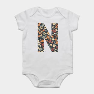 A vintage flower pattern filling the letter N Baby Bodysuit